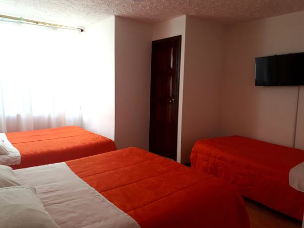 Imagen de la habitación del Hotel HOTEL DINNAR. Foto 2
