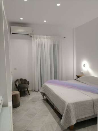 Imagen de la habitación del Hotel HOTEL DOUKISSA. Foto 11