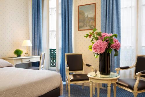 Imagen de la habitación del Hotel HOTEL DU PRINTEMPS. Foto 17