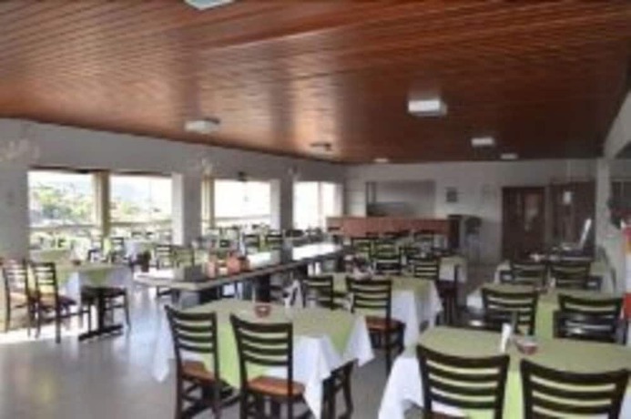 Imagen del bar/restaurante del Hotel HOTEL ESCARPAS DO LAGO CAPIT&Oacute;LIO. Foto 3