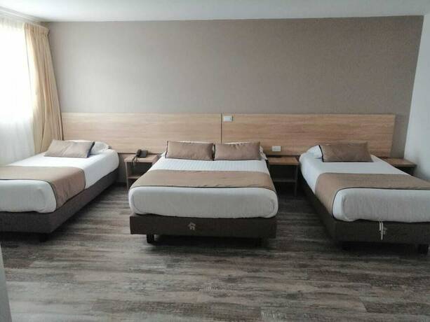 Imagen de la habitación del Hotel HOTEL EXPO INN AGORA. Foto 11