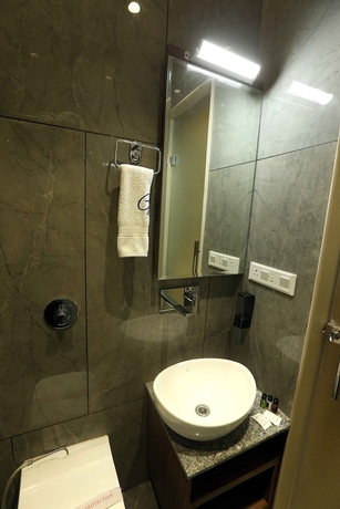 Imagen de la habitación del Hotel HOTEL GC GRAND INN. Foto 11