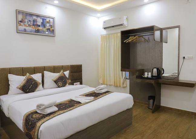 Imagen de la habitación del Hotel HOTEL GULMOHAR PLAZA BY AUROVILLE ENT. Foto 8