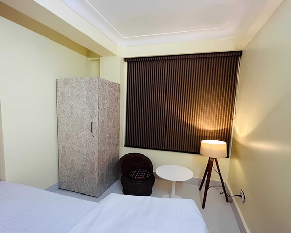 Imagen de la habitación del Hotel HOTEL GUWAHATI INN. Foto 8