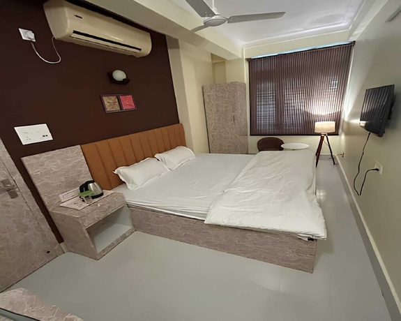 Imagen de la habitación del Hotel HOTEL GUWAHATI INN. Foto 10