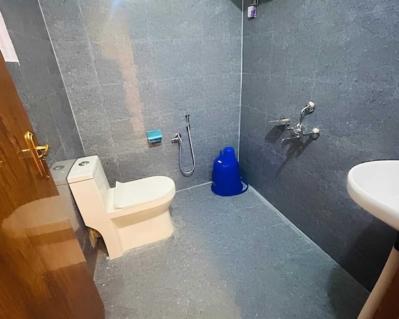 Imagen de la habitación del Hotel HOTEL GUWAHATI INN. Foto 15
