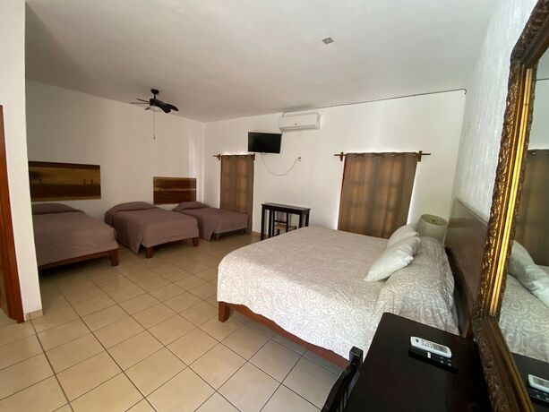 Imagen de la habitación del Hotel HOTEL LA CASA DE LAS COCADAS. Foto 18