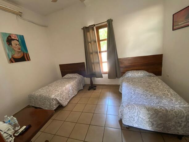 Imagen de la habitación del Hotel HOTEL LA CASA DE LAS COCADAS. Foto 19