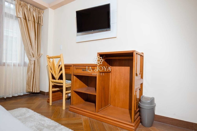 Imagen de la habitación del Hotel HOTEL LA JOYA. Foto 8
