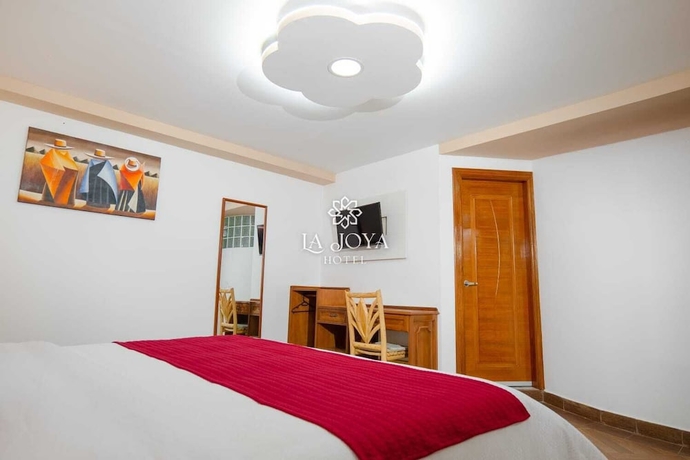 Imagen de la habitación del Hotel HOTEL LA JOYA. Foto 10