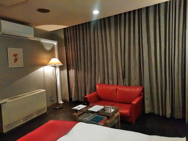 Imagen de la habitación del Hotel HOTEL LIBERTY KOCHI. Foto 11