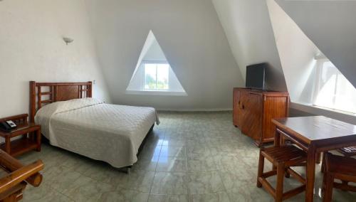 Imagen de la habitación del Hotel HOTEL LORD PIERRE. Foto 18