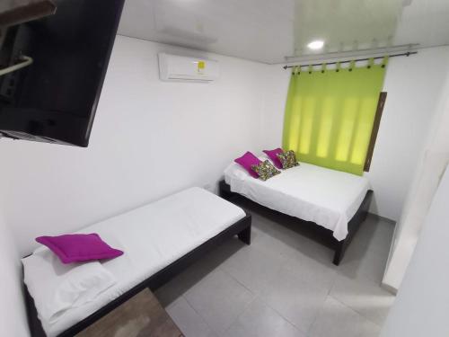 Imagen de la habitación del Hotel HOTEL LOS TAMBOS DEL CARIBE BEACH. Foto 18