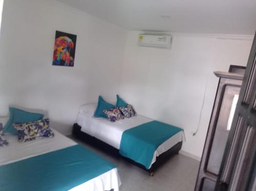 Imagen de la habitación del Hotel HOTEL LOS TAMBOS DEL CARIBE BEACH. Foto 19