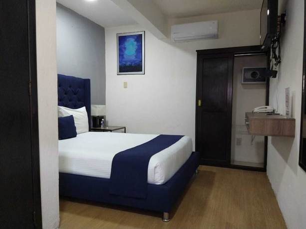 Imagen de la habitación del Hotel HOTEL LUNADA. Foto 3