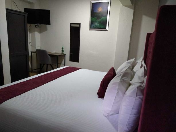 Imagen de la habitación del Hotel HOTEL LUNADA. Foto 5