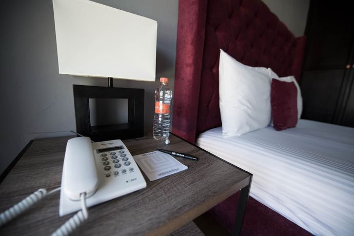 Imagen de la habitación del Hotel HOTEL LUNADA. Foto 7