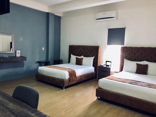 Imagen de la habitación del Hotel HOTEL LUNADA. Foto 11