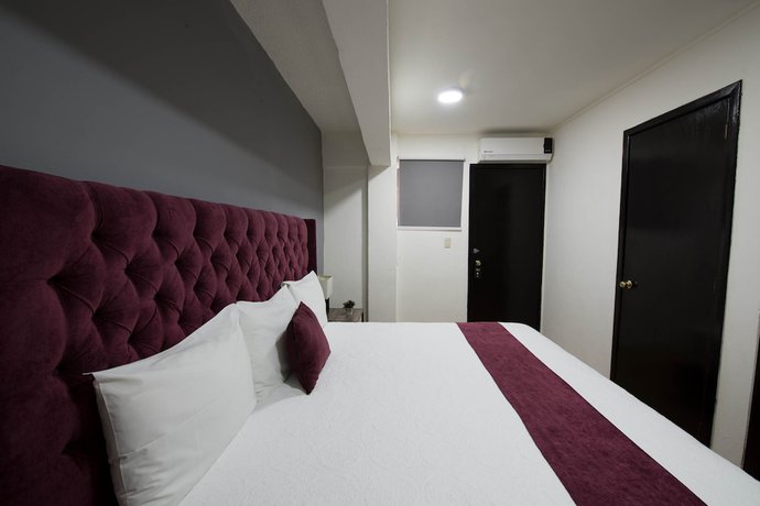 Imagen de la habitación del Hotel HOTEL LUNADA. Foto 14