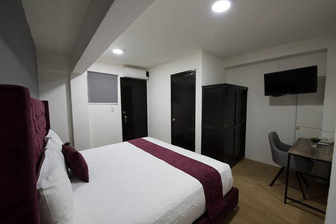 Imagen de la habitación del Hotel HOTEL LUNADA. Foto 16