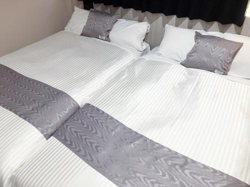 Imagen de la habitación del Hotel HOTEL LiVEMAX Honhachinohe Ekimae. Foto 19