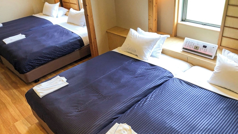 Imagen de la habitación del Hotel HOTEL LiVEMAX Kuroishi. Foto 2