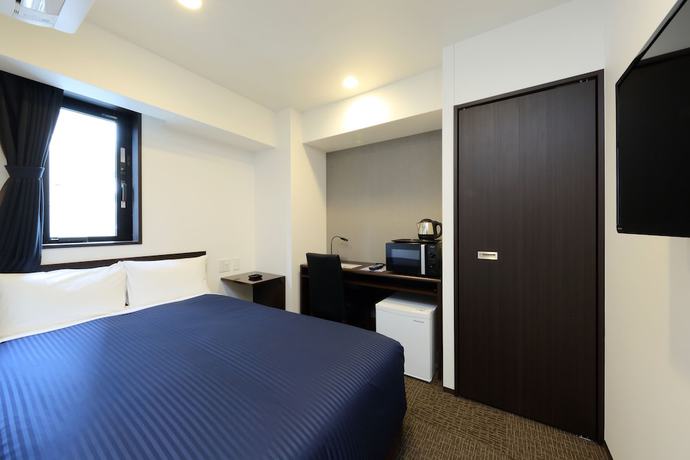 Imagen de la habitación del Hotel HOTEL LiVEMAX Meieki. Foto 5
