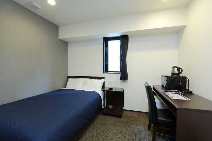 Imagen de la habitación del Hotel HOTEL LiVEMAX Meieki. Foto 8