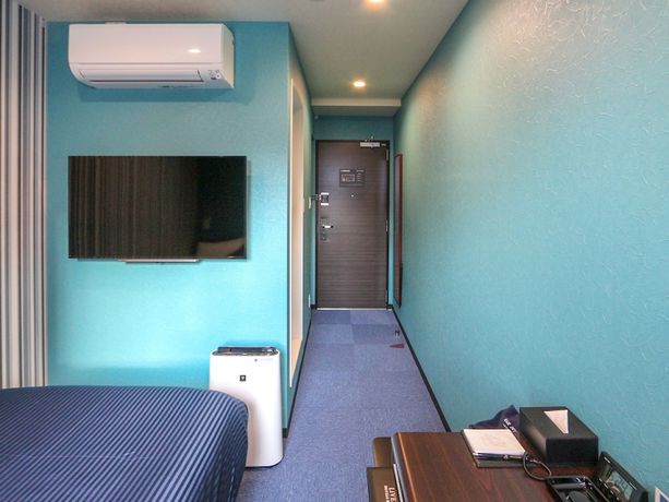 Imagen de la habitación del Hotel HOTEL LiVEMAX Numazu Ekimae. Foto 11