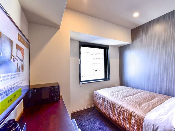 Imagen de la habitación del Hotel HOTEL LiVEMAX Shin Yokohama. Foto 2