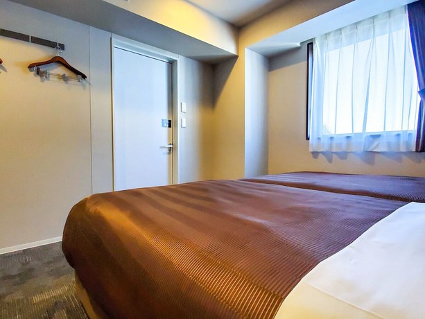 Imagen de la habitación del Hotel HOTEL LiVEMAX Tachikawa Ekimae. Foto 11