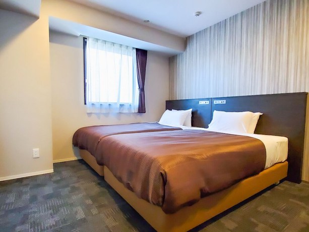 Imagen de la habitación del Hotel HOTEL LiVEMAX Tachikawa Ekimae. Foto 19