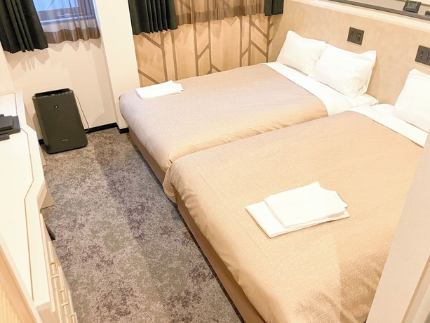 Imagen de la habitación del Hotel HOTEL LiVEMAX Tendo. Foto 5