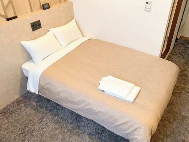 Imagen de la habitación del Hotel HOTEL LiVEMAX Tendo. Foto 9
