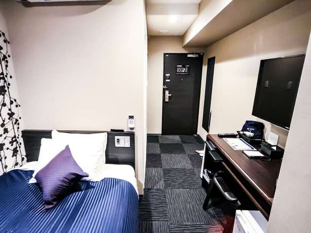 Imagen de la habitación del Hotel HOTEL LiVEMAX Tokyo-Otsuka Ekimae. Foto 6
