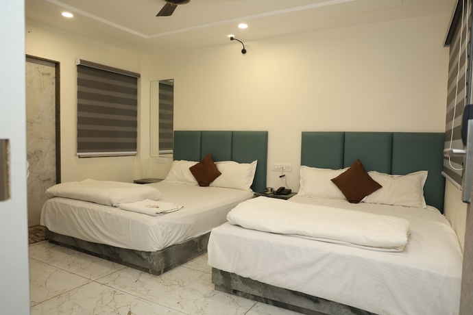 Imagen de la habitación del Hotel HOTEL MAGNET - INDORE. Foto 2
