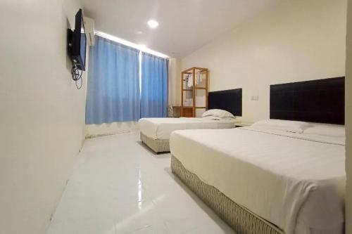Imagen de la habitación del Hotel HOTEL MALAYSIA. Foto 2