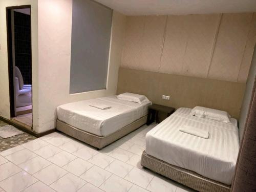 Imagen de la habitación del Hotel HOTEL MALAYSIA. Foto 4