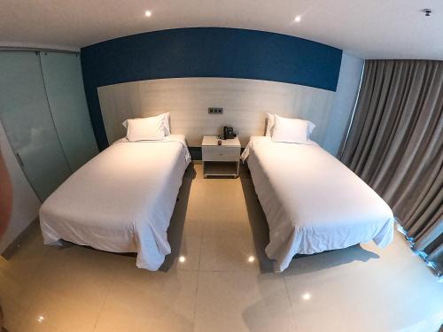 Imagen de la habitación del Hotel HOTEL MANZUR. Foto 17