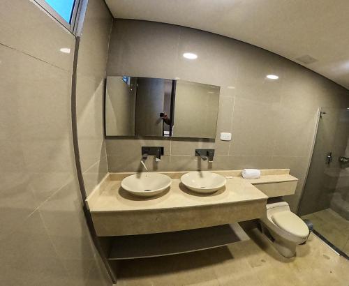Imagen de la habitación del Hotel HOTEL MANZUR. Foto 19