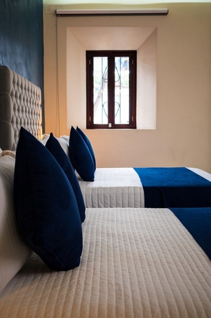 Imagen de la habitación del Hotel HOTEL MARGARITA. Foto 3