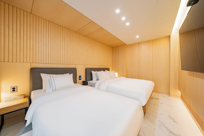 Imagen de la habitación del Hotel HOTEL MARIESTAY TAEN. Foto 11