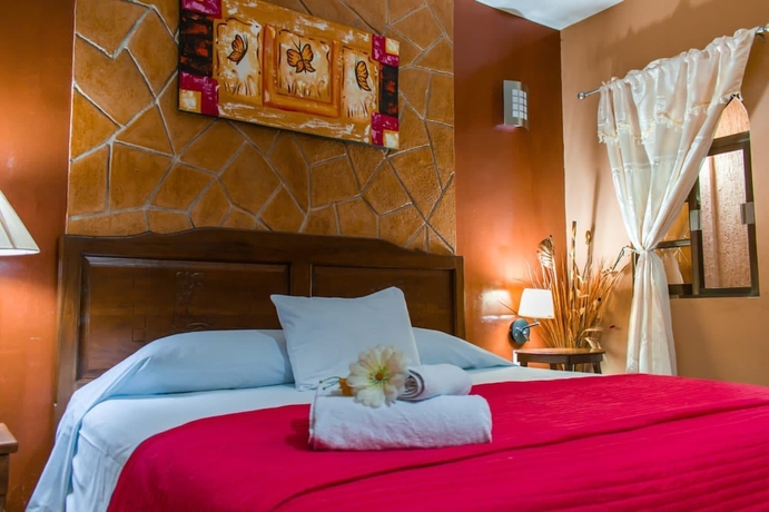 Imagen de la habitación del Hotel HOTEL MAYA HAU. Foto 3