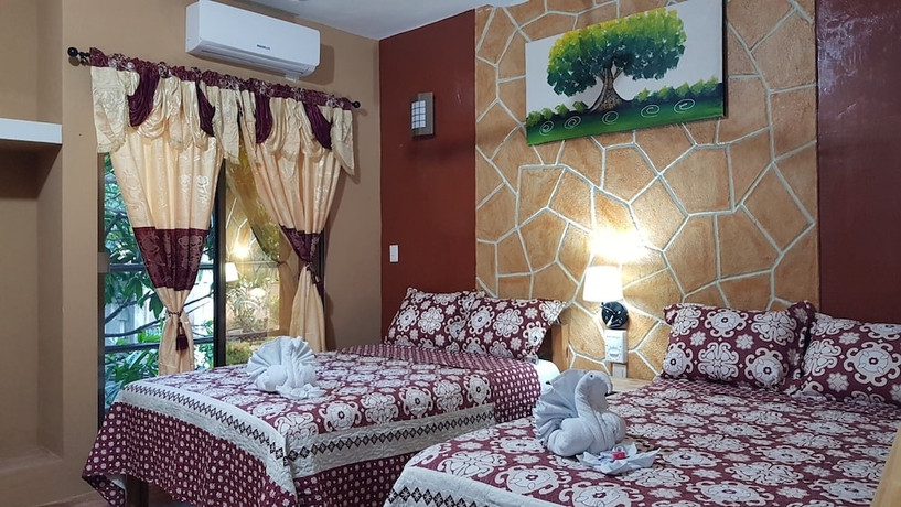 Imagen de la habitación del Hotel HOTEL MAYA HAU. Foto 12