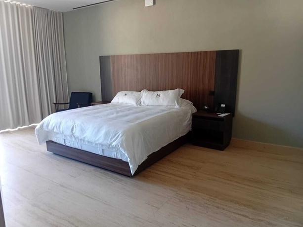 Imagen de la habitación del Hotel HOTEL MONTES SUITES. Foto 9