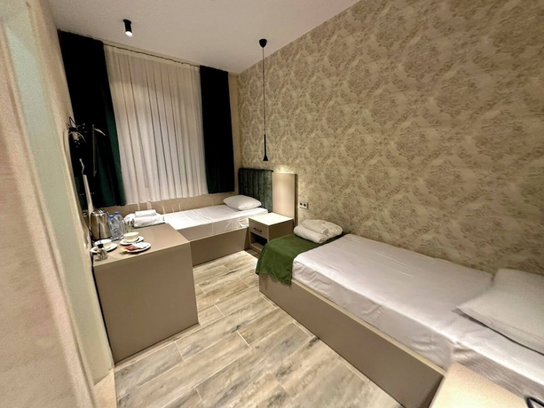 Imagen de la habitación del Hotel HOTEL NEON. Foto 3