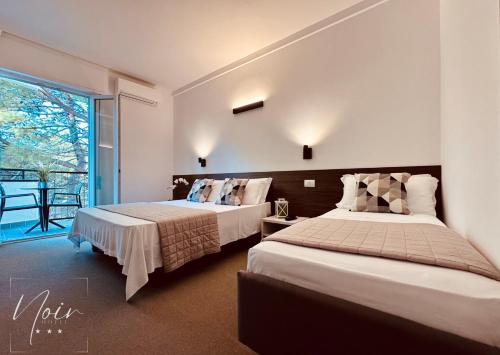 Imagen de la habitación del Hotel HOTEL NOIR - Free Breakfast & Brunch Until 13-00 - Vicinissimi a Mirabilandia. Foto 20