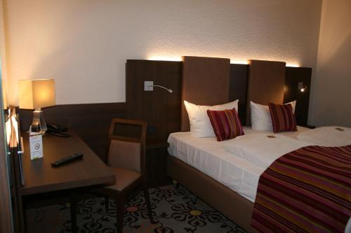 Imagen de la habitación del Hotel HOTEL PARQ&Eacute;O im A66. Foto 7