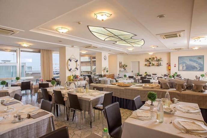 Imagen del bar/restaurante del Hotel HOTEL PATRIZIA. Foto 5