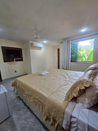 Imagen de la habitación del Hotel HOTEL POUSADA BAMBUZAL. Foto 14